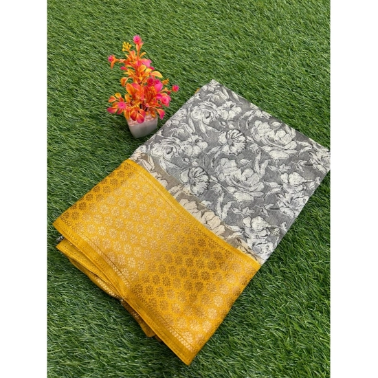 Generic Women's Cotton Blend Printed Saree With Unstitched Blouse (Black, 5-5 Mtrs) Generic Women's Cotton Blend Printed Saree With Unstitched Blouse (Black, 5-5 Mtrs)