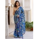 Generic Women's Georgette Floral Printed Saree With Unstitched Blouse 5.5Mtr (Blue) Generic Women's Georgette Floral Printed Saree With Unstitched Blouse 5.5Mtr (Blue)