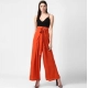 Generic Women's Polyester Solid Smocked Trousers (Orange) Generic Women's Polyester Solid Smocked Trousers (Orange)